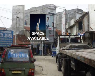 Sewa Reklame Billboard Tokabe.id - Di SM. Raja Street, di persimpangan dengan Kartini Street, Perdagangan Town, Kabupaten Simalungun, Provinsi Sumatera Utara - Titik billboard strategis Medan